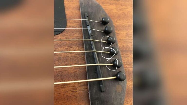 Why Do My Guitar Strings Buzz: Top Causes & Easy Fixes