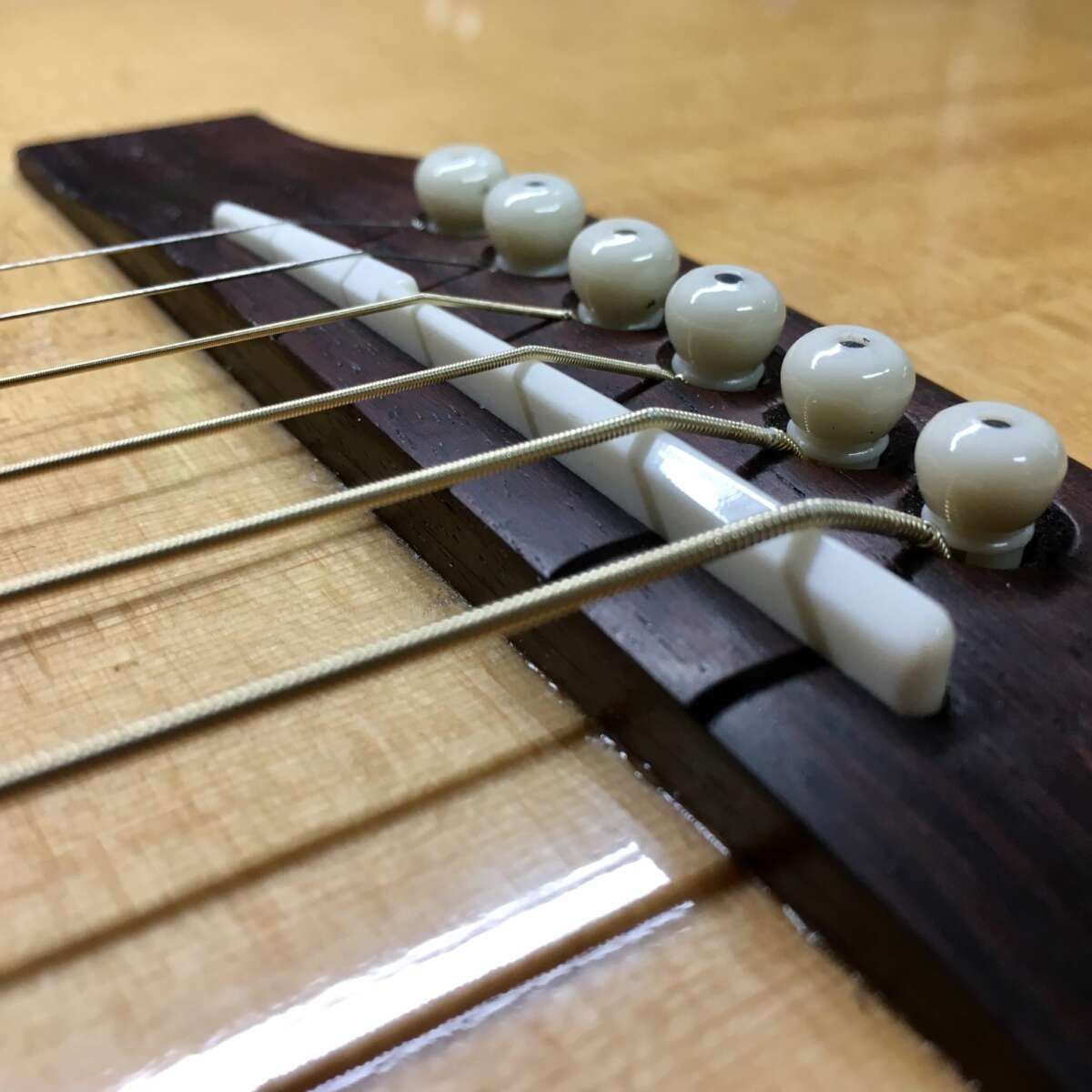 What Is The Saddle On A Guitar